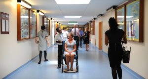 Main corridor at Ipswich Hospital with staff and patients