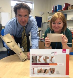 Consultant vascular surgeon and nurse with the Juxta Cures device