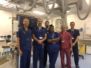 Six members of the ESNEFT heart team standing in the lab at the Ipswich Heart Centre