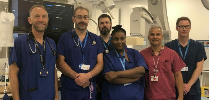 Six staff from the Ipswich heart team standing in the lab at the heart centre